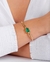Pulseira no banho de ouro com pedra de zircônia