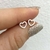 abridor corazón acero blanco