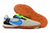 Chuteira Nike Streetgato Futsal cinza com solado laranja e detalhes em azul e verde