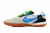 Chuteira Nike Streetgato Futsal cinza com solado laranja e detalhes em azul e verde