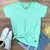 Camiseta Feminina Verde Menta Cruz Prata Jesus Cristo