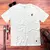 Camiseta Masculina Off White Escudo Fé Detalhe - comprar online