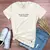 Camiseta Feminina Off White Tua Voz Me Chama Sobre As Águas