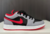 Air Jordan 1 Low Black Cement Grey Fire Red na internet