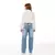 Calça Feminina Infantil Jeans Wide Leg Strass Pochete Laço na internet