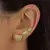 Brinco formato coração cravejado com micro zircônias - Banhada a Ouro 18K - comprar online