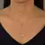 Colar gravata com zircônias redondas nas pontas - Tam: 60cm - Banhado a Ouro 18K - comprar online