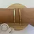 elegante Bracelete Liso com Trava em Dourado, uma peça que une sofisticação e versatilidade. Feito em material de alta qualidade, este bracelete exala um brilho radiante que complementa qualquer look, seja para o dia a dia ou ocasiões especiais.
