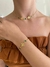 Conjunto trevo com pedra verde banhado a ouro 18k - comprar online