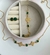 Conjunto trevo com pedra verde banhado a ouro 18k - Finnus semijoias