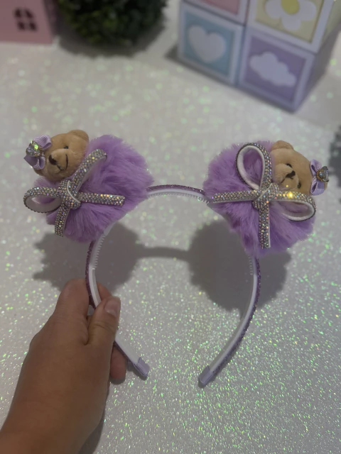 Tiaras ursinho com pompom na internet