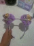 Tiaras ursinho com pompom na internet