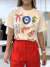 TSHIRT OLHO GREGO