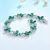 Pulseira Flores Geométricas com Esmeraldas - loja online