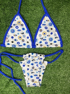 BIQUÍNI OLHO GREGO AZUL CURTININHA na internet