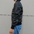 Campera de cuero bomber para hombre, vista lateral.