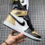 Jordan Air Jordan 1 High NRG Patent con puntera dorada