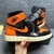 Air Jordan 1 naranja y negro