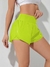 SHEIN Running Shorts esportivo de cintura larga com bainha em forma de golfinho, shorts elástico - comprar online