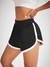 SHEIN Running Shorts esportivo de cintura larga com bainha em forma de golfinho, shorts elástico