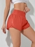 SHEIN Running Shorts esportivo de cintura larga com bainha em forma de golfinho, shorts elástico - tienda online