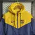 Jaqueta Corta Vento Barcelona 23/24 Nike - Amarelo - Loja DG imports