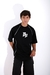 Remera Over Border Negra - kyro mayorista