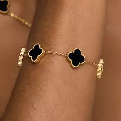 Pulseira Trevo Preto - Banho de ouro 18k. na internet