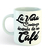 Taza blanca con la frase "La Vida Comienza después de un Café" en letras decorativas.