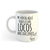 Taza blanca con frase motivacional que dice "Me voy de aquí todos están locos ¡arre unicornio!" y un dibujo de un unicornio.