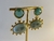 BRINCO DOURADO OVAL TURQUESA