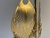 BRINCO DOURADO COM ARABESCOS E PINGENTES GOTA na internet