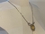 COLAR CRAVEJADO NOSSA SENHORA PRATA E DOURADO - loja online
