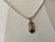 COLAR RIVIERA PRATEADO COM PINGENTE DOURADO LETRA N - comprar online