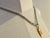 COLAR RIVIERA PRATEADO COM PINGENTE DOURADO LETRA N - L’Lexia Acessórios Femininos