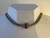 CHOKER PRATEADA COM PEDRA RETANGULAR VERMELHA