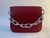 BOLSA VERMELHA COM CORRENTE PRATEADA SHEILA MORAIS - comprar online