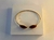 BRACELETE DOURADO PEQUENO COM PEDRAS MARRONS na internet