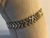 PULSEIRA EM OURO E RODIO COM FLECHAS DETALHADAS DE CRISTAIS - comprar online