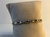 PULSEIRA EM OURO E RÓDIO COM CORAÇÕES E DETALHES DE CRISTAIS