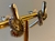 BRINCO EAR HOOK X DETALHADO ZIRC RODIO na internet