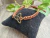 Pulseira Macramê Triquetra - comprar online