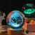 Essa Luminária deixará sua casa ainda mais linda com elegância e aconchego! A Luminária Decorativa Espacial 3D - Cosmic Glow é uma peça incrível que - loja online