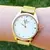 Relogio Feminino Champion Dourado CN26993M