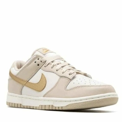 Nike Dunk Low Gold Swoosh en internet