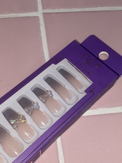 Uñas postizas Moño en internet