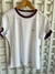 Camiseta Feminina Branca Gola Lilás ONG CÃO SEM DONO na internet