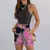 Conjunto feminino de fibra sintética com blusa de gola alta e shorts com cinto. - GBShop