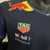 Camiseta negra del equipo Red Bull Racing F1 2023/24