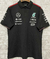 Camiseta POLO del equipo negro Mercedes AMG Petronas F1 2024/25